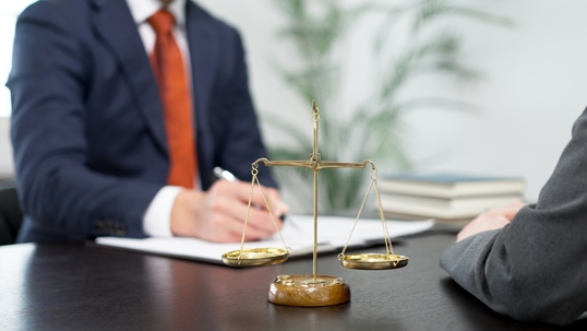 client consulting with attorney